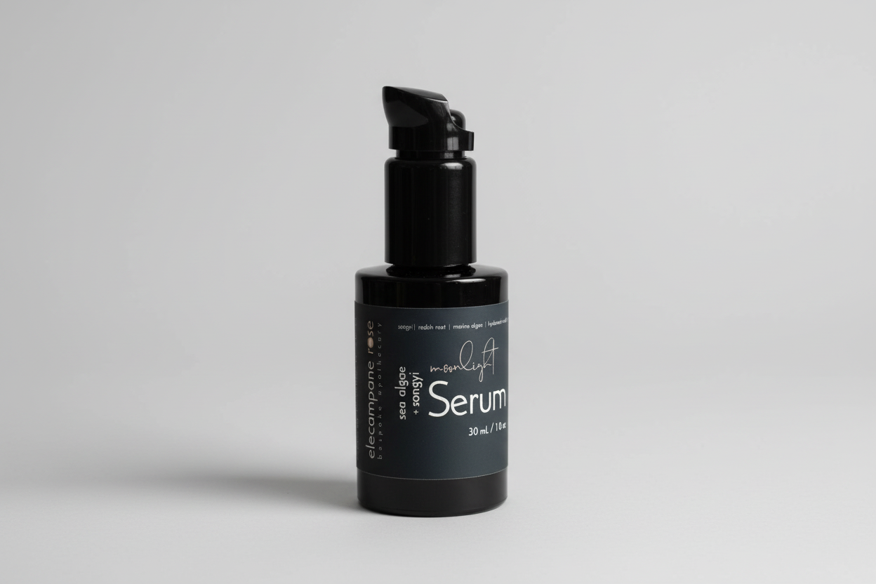 Black serum bottle with label on a light background