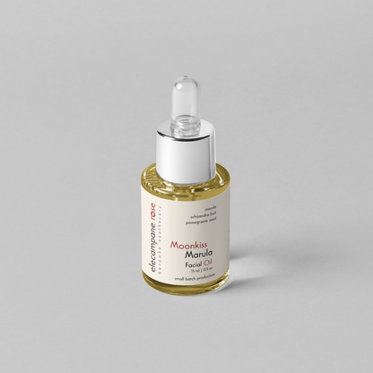 small glass dropper bottle of facial oil
