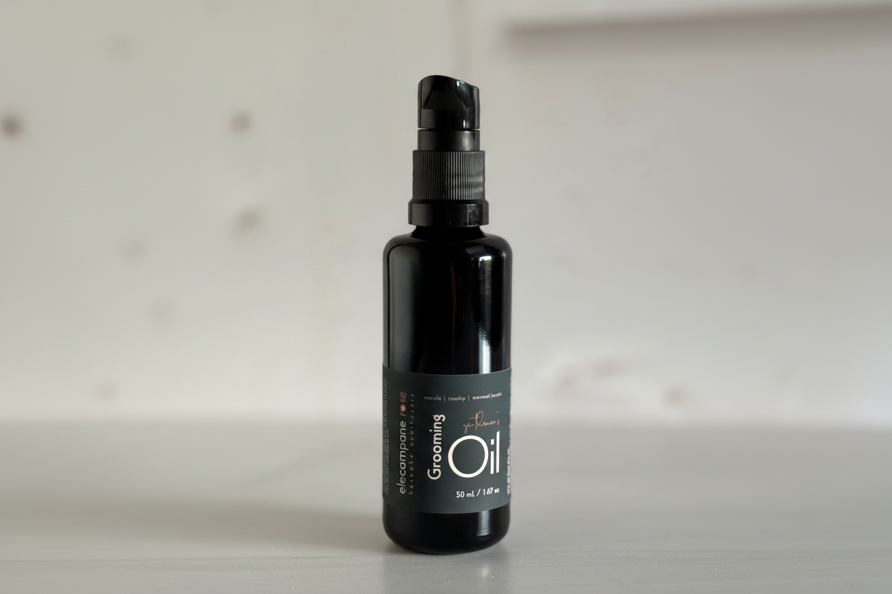 Black grooming oil bottle on a light gray background